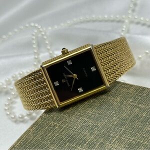 Vintage Pierre Cardin Gold Tank Watch with Black Dial and Diamond Markers